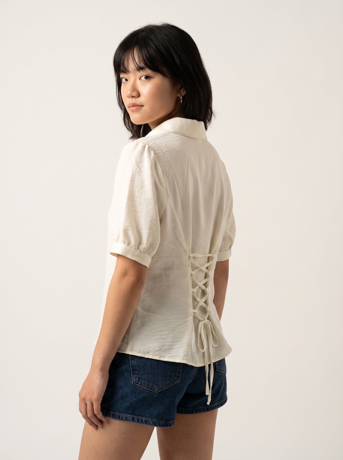 AVENU. The Cream Ruched Top